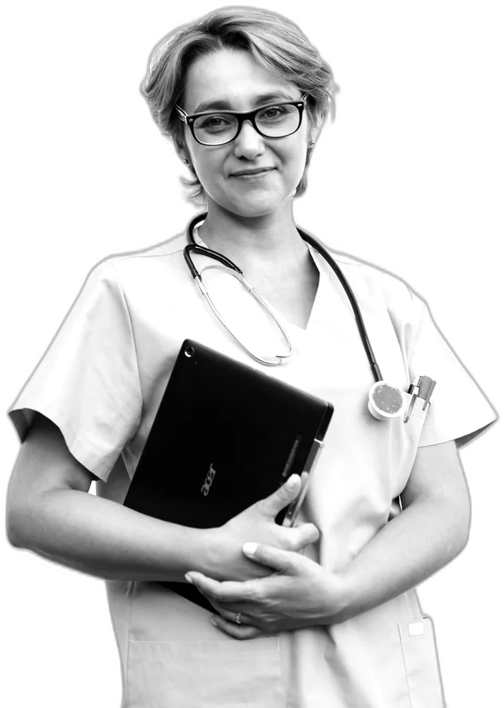 A healthcare professional using a secure, DVG Systems-managed workstation