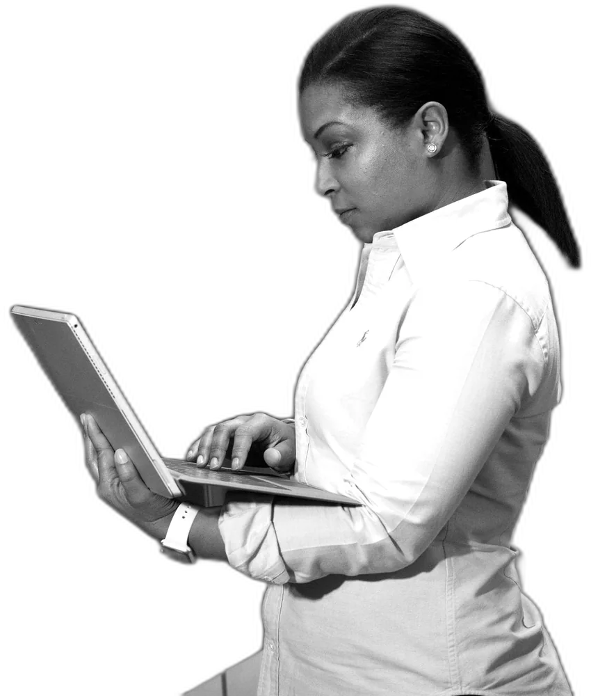 A DVG Systems engineer reviewing an Azure environment on a laptop